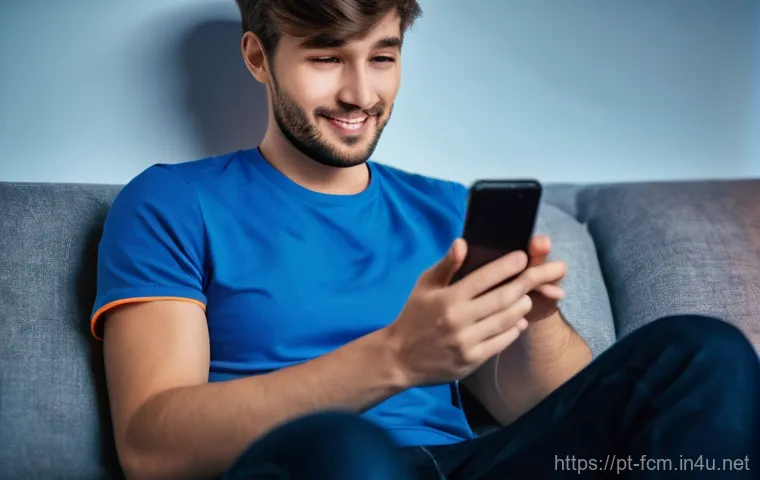 FC모바일 업데이트 버전 확인 및 설치 - **Prompt:** A young adult male, casually dressed, sitting comfortably on a sofa, illuminated by the ...